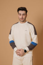 Closeup of Nextage men’s contrast cream cotton crew neck sweatshirt and joggers