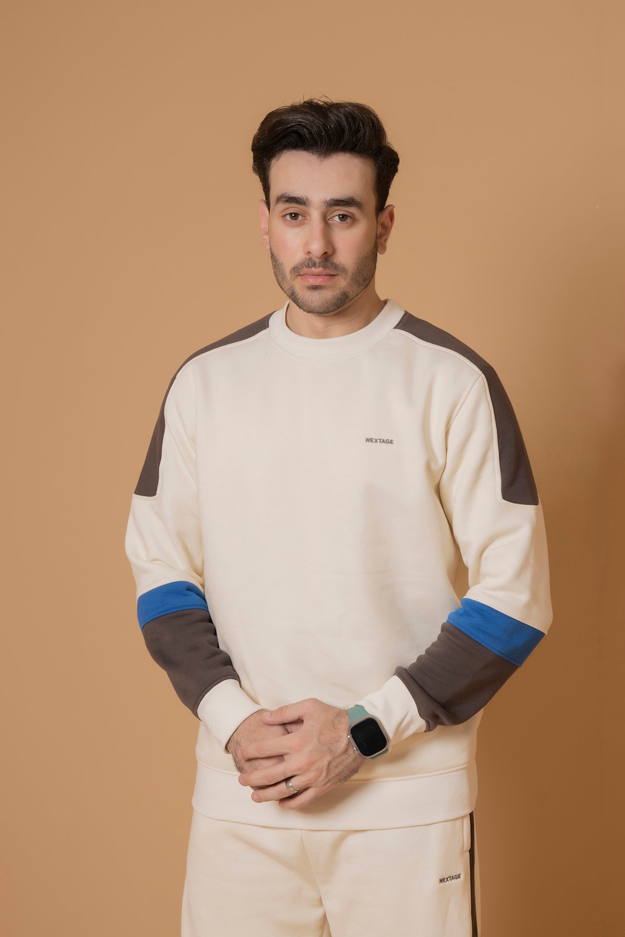 Closeup of Nextage men’s contrast cream cotton crew neck sweatshirt and joggers