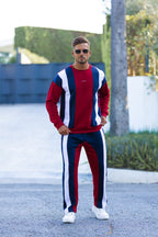 Nextage Model wearing a Maroon, white, and blue striped outfit standing outdoors.