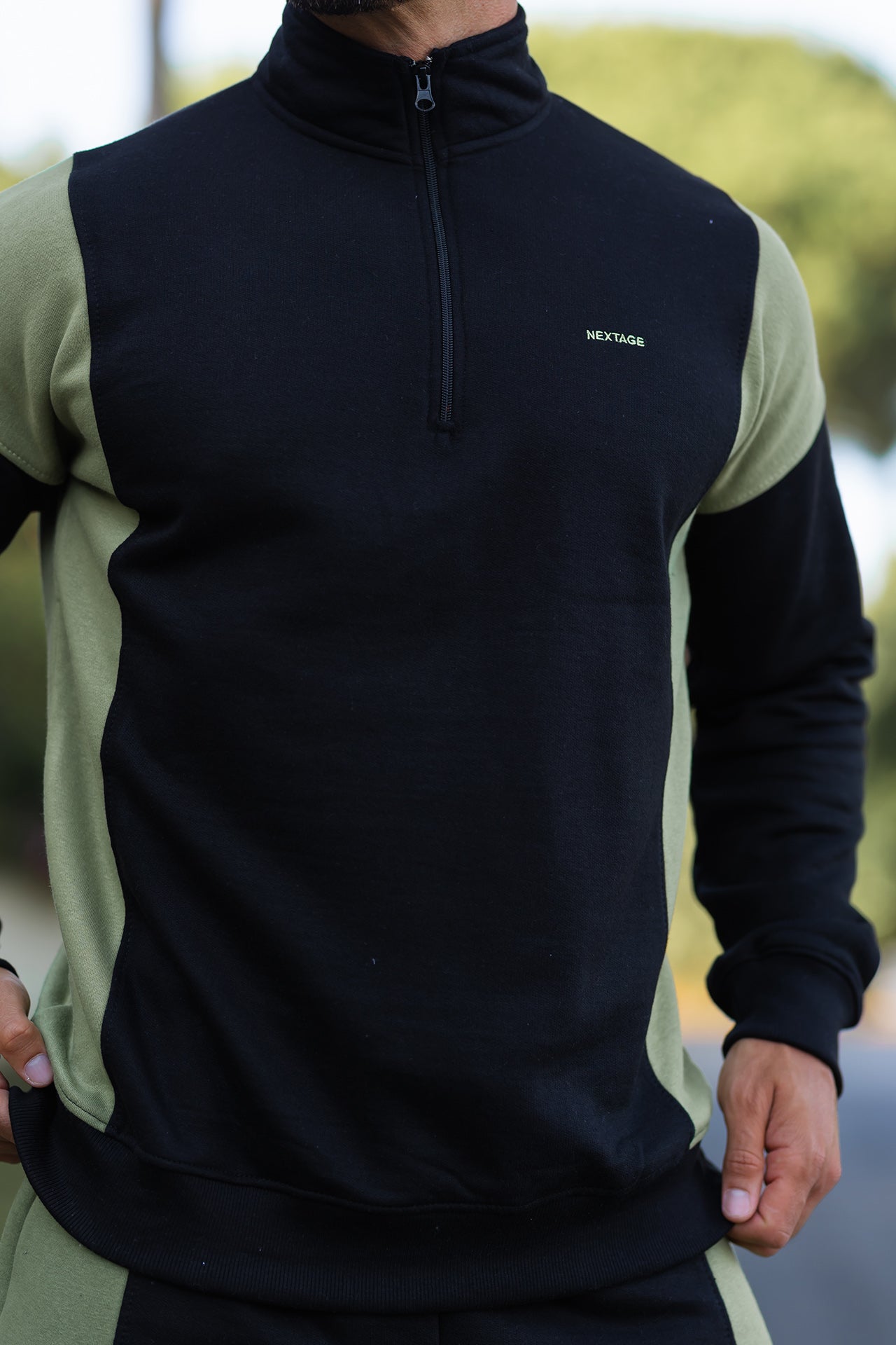 Nextage color-block tracksuit set for men in black and khaki, designed for comfort and modern urban style.