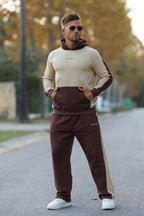 nextage model wear drop shoulder hoodie with oatmeal and brown color 