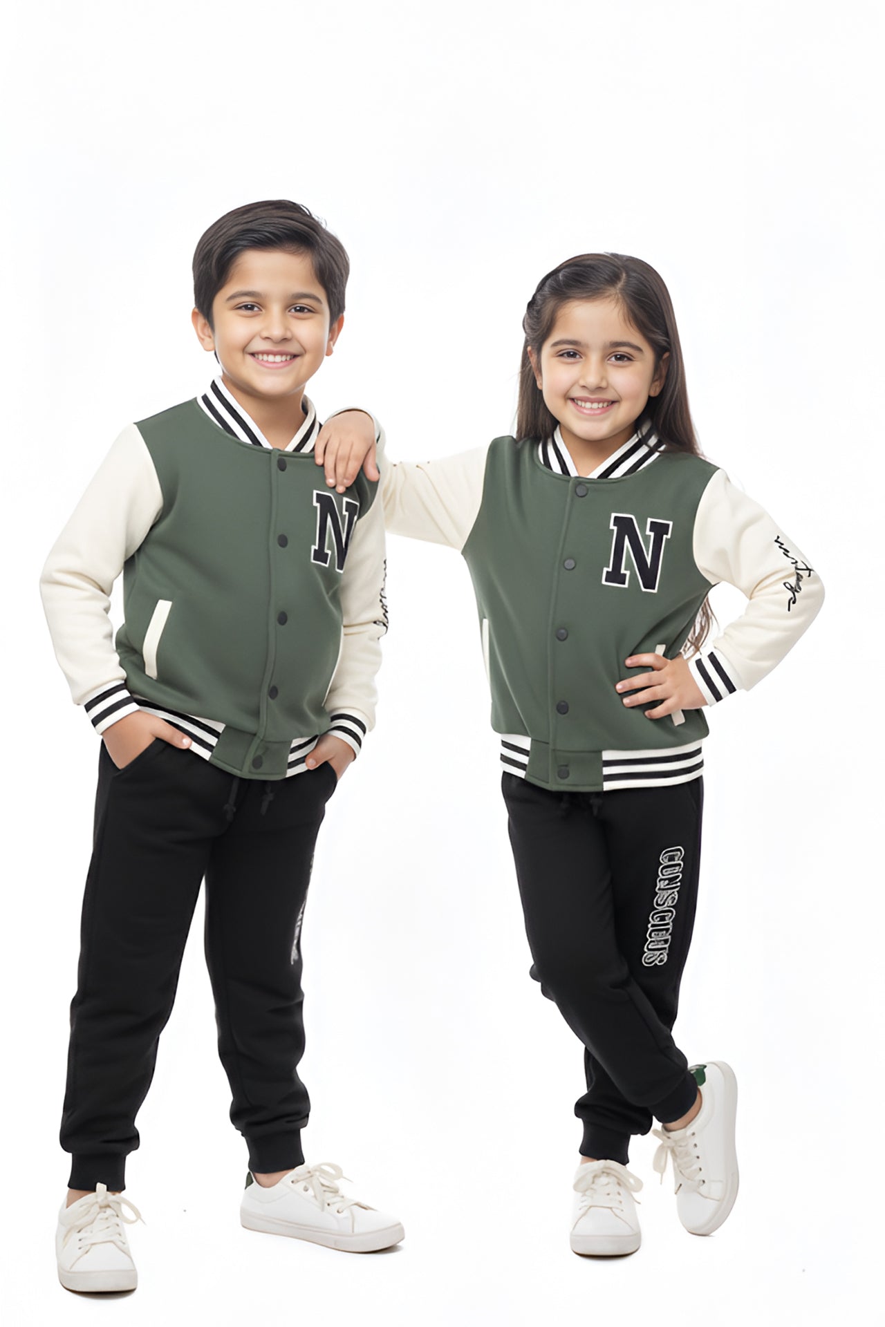 Two children wearing matching green varsity jackets with a letter 'N' on a white background