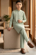 soft sage green shalwar kameez- sitting side view