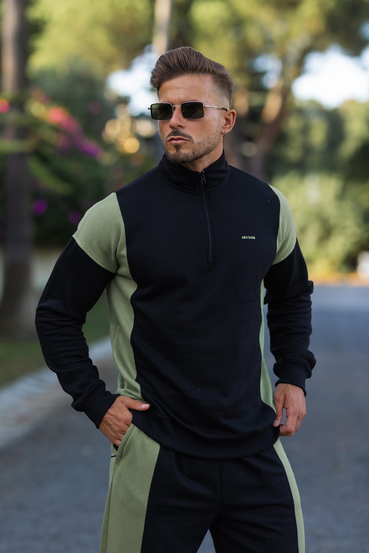 Trendy men’s Nextage Oversized Tracksuit featuring contrast khaki panels on sleeves and legs for a sporty look.