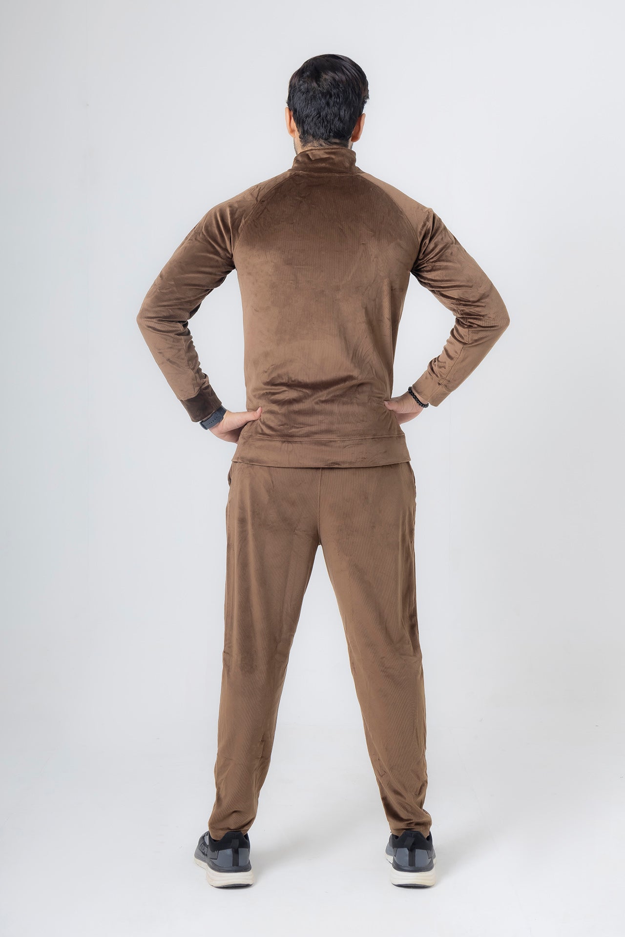 nextage tracksuit velour fabric back look of model wearing size medium shop now from nextage.com.pk