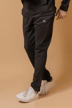 Trouser view of men’s black winter tracksuit by Nextage, casual slim fit sportswear