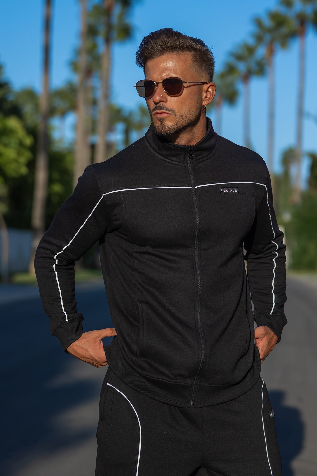 model wear nextage black zipper sweatshirt with contrast white piping 