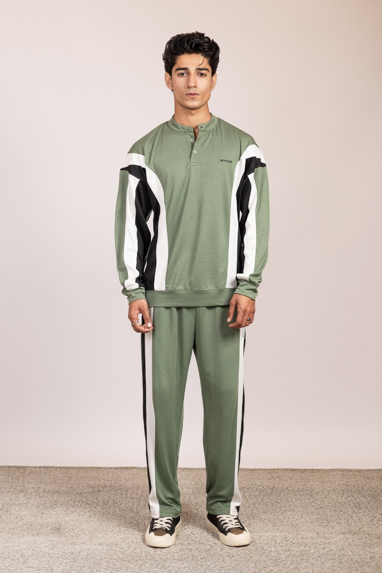 Nextage men’s olive green colorblock track suit front view with black and white panels