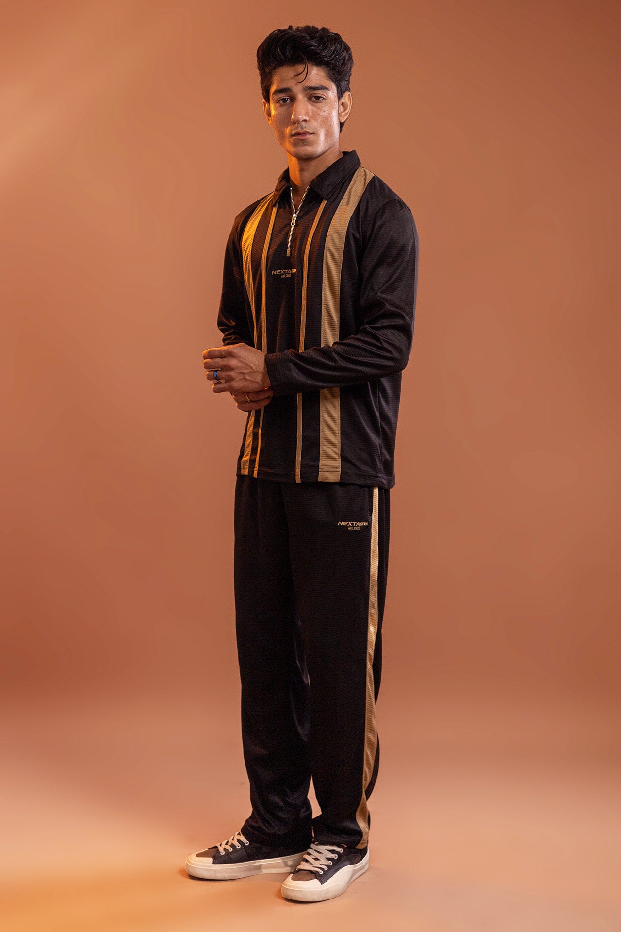 Nextage lightweight breathable fabric detail of black track suit