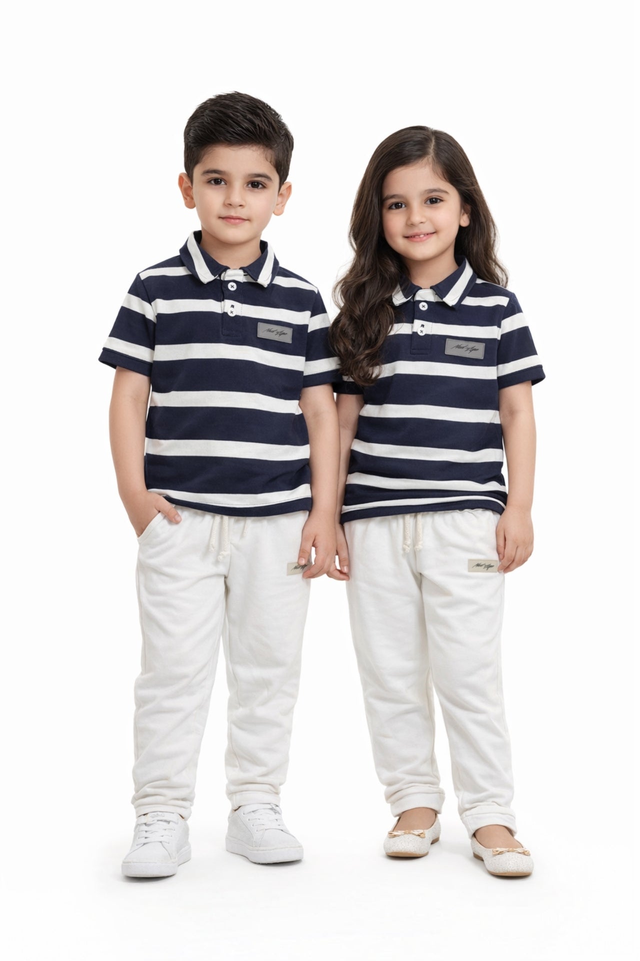 Front view of Nextage kids navy and white striped polo co-ord set
