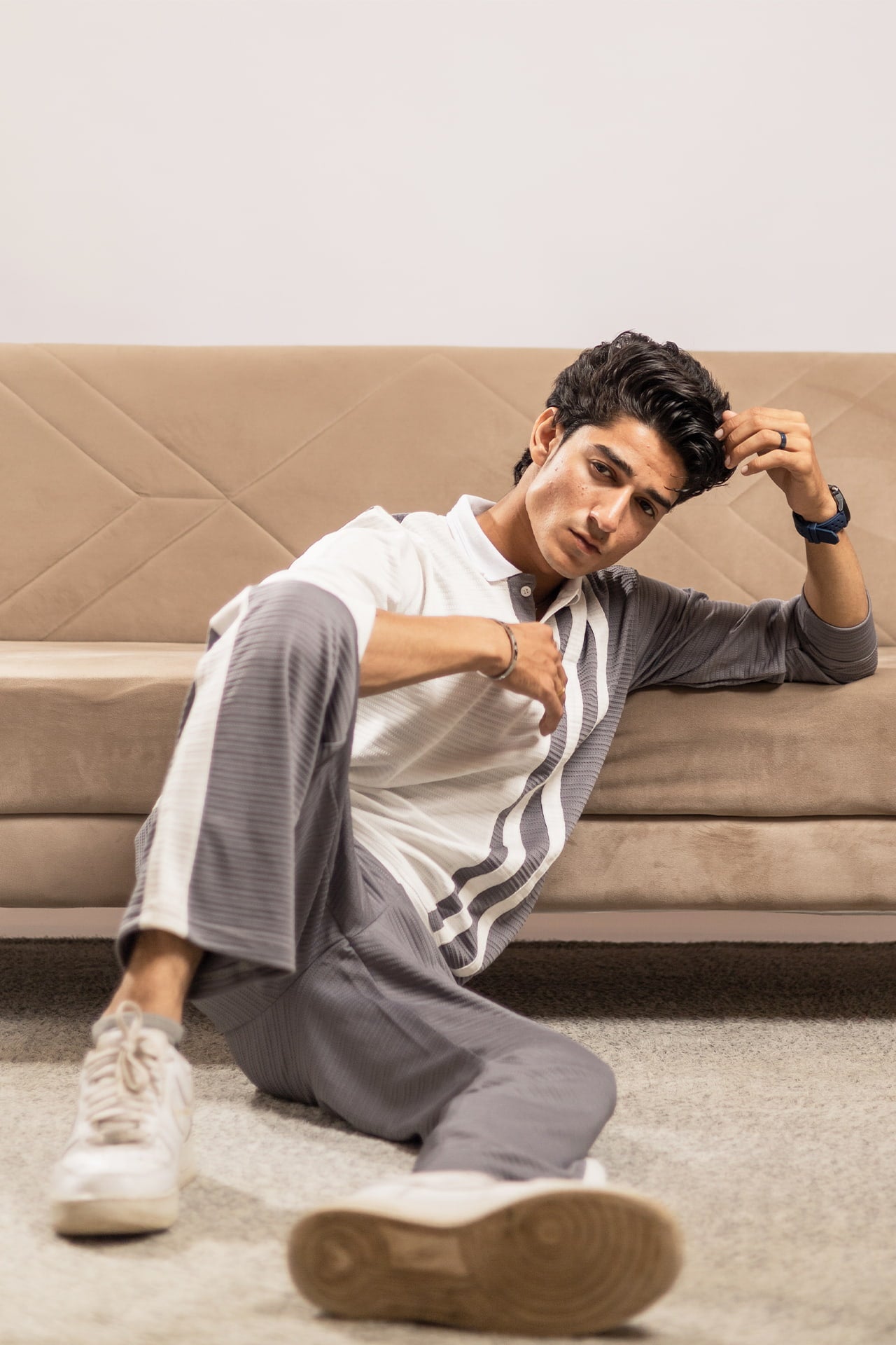 Model wearing Nextage grey and white knit co-ord set