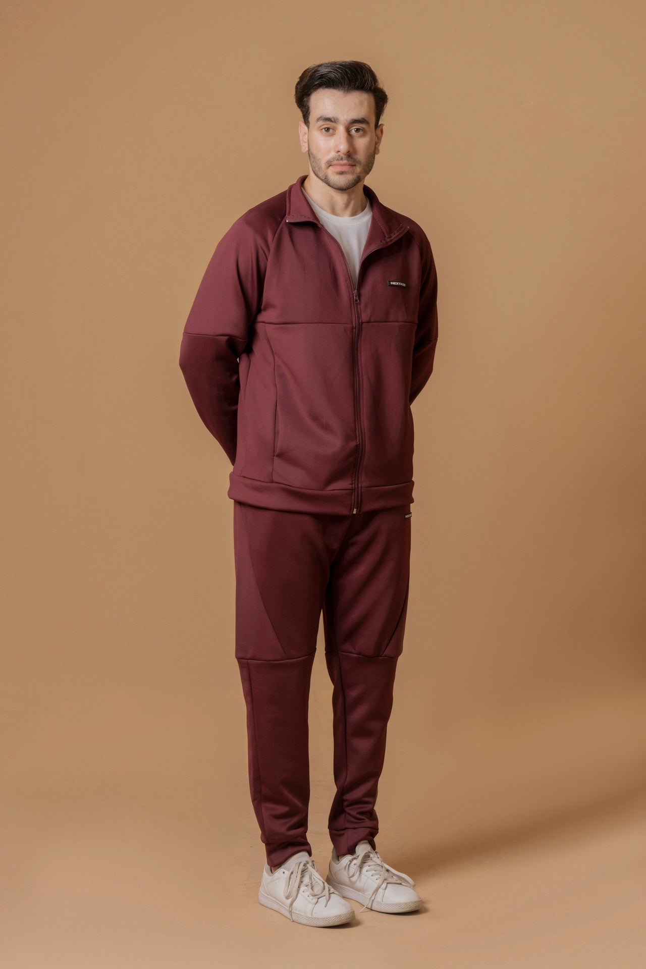 Full body view of Nextage men’s burgundy winter tracksuit, stylish slim fit design