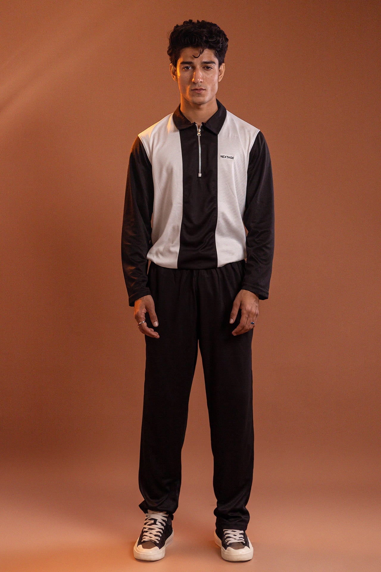 Nextage black and white contrast panel zip track suit for men front view