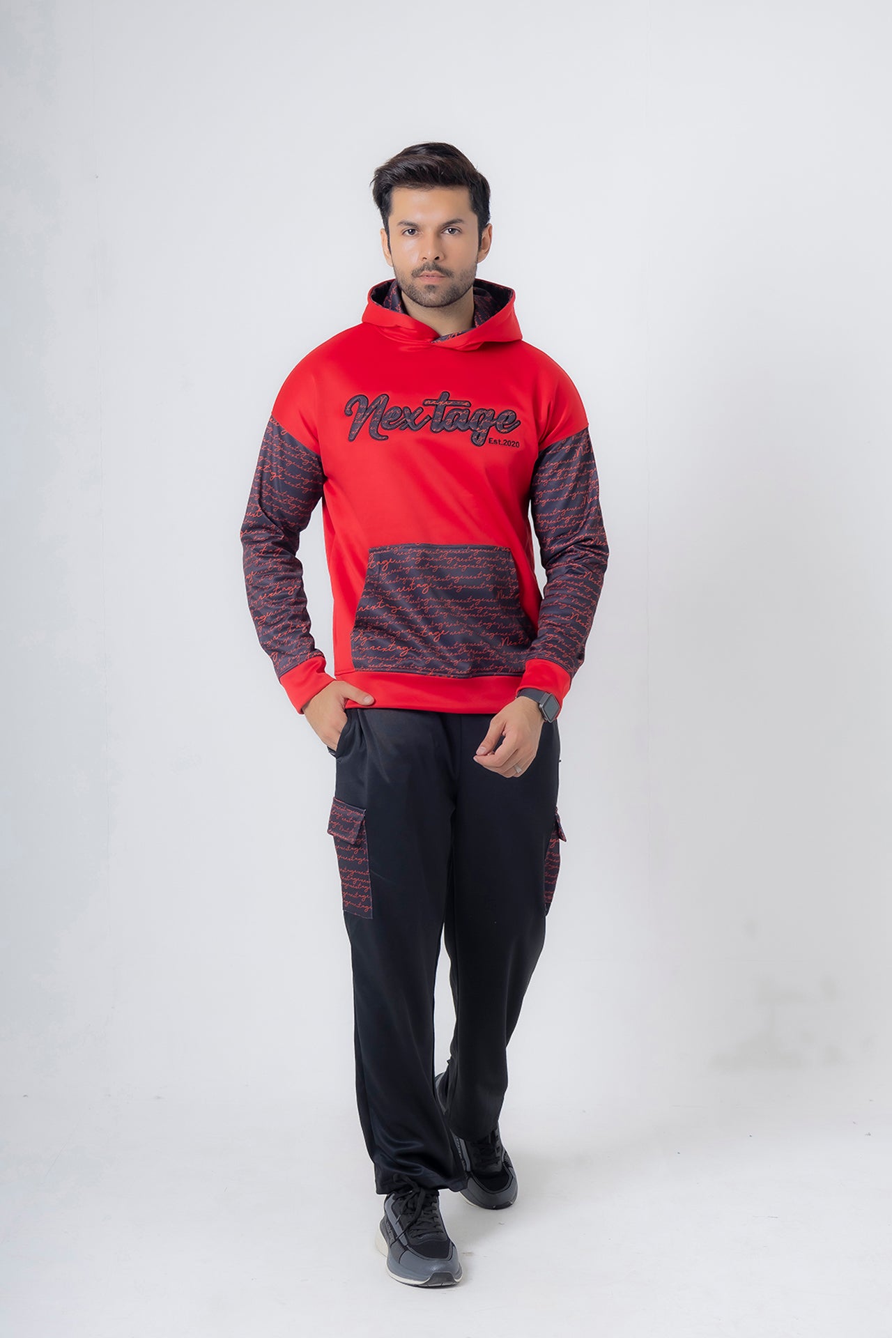 Nextage model wearing it's signature premium tracksuit size medium.