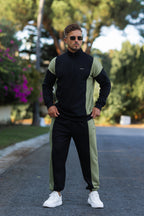 Stylish oversized Nextage Tracksuit in black and khaki color blocking, perfect for casual and athletic wear.